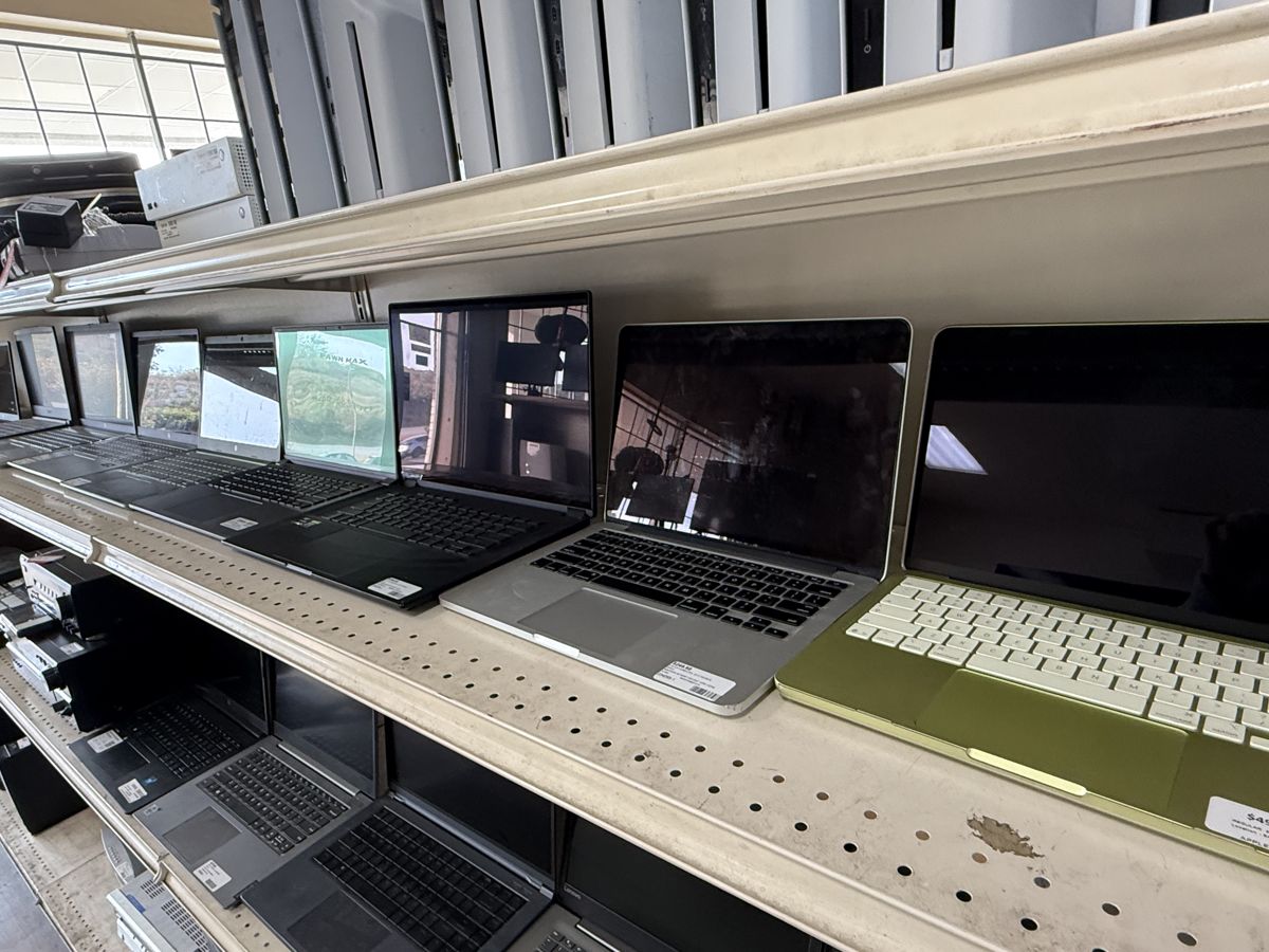 Laptops and MacBooks on display