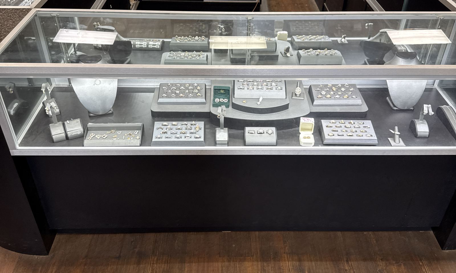 Jewelry display cases full of rings at Pawn Max